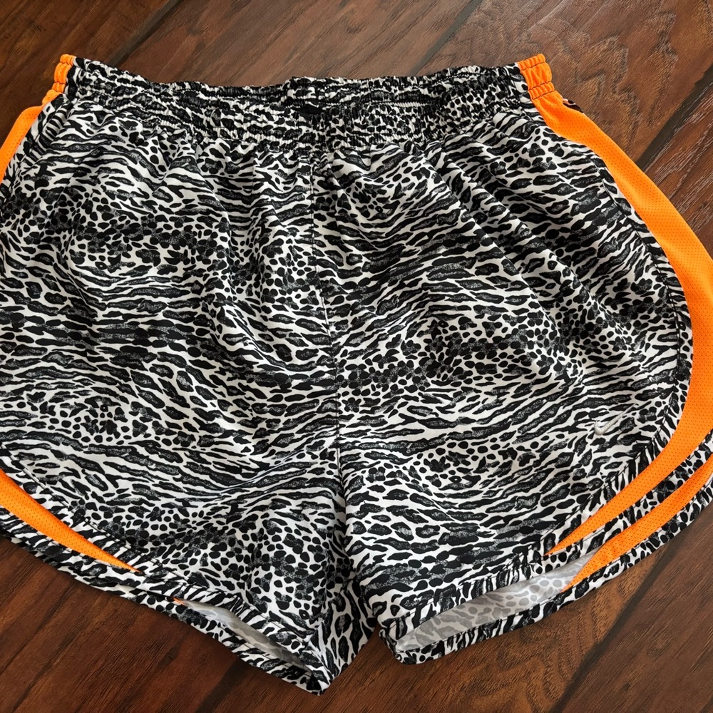 Nike Women's Black and White Patterned Shorts with Orange Trim